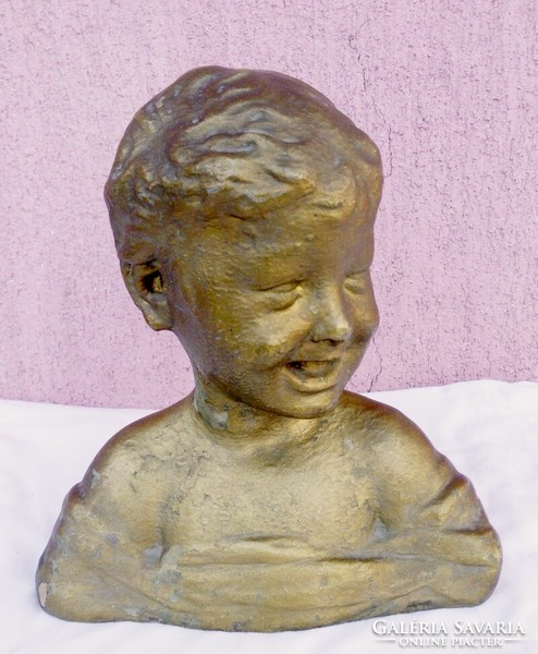A terracotta bust of a laughing child, a unique antique rarity