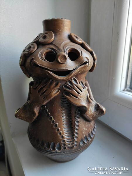 A charming Romanian ceramic vase or candle holder, but never mind Tóbiás, freshly permed, it also sounds great :)