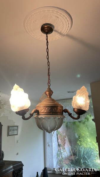 Antique three-pronged copper chandelier