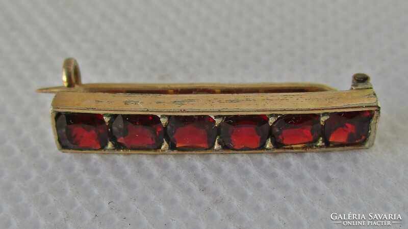 Wonderful antique gold-plated brooch with garnet-like stones