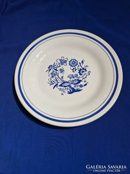 Ceramic plate with blue pattern and blue stripes
