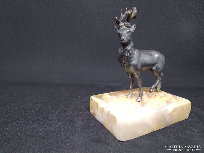 Bronze deer on a marble plinth
