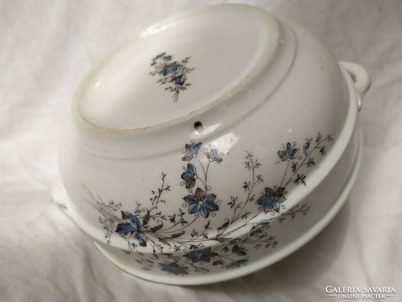 Old thick-walled porcelain stew bowl with painted flowered handles