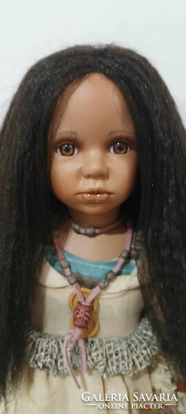 For sale is a damaged porcelain doll (56 cm)