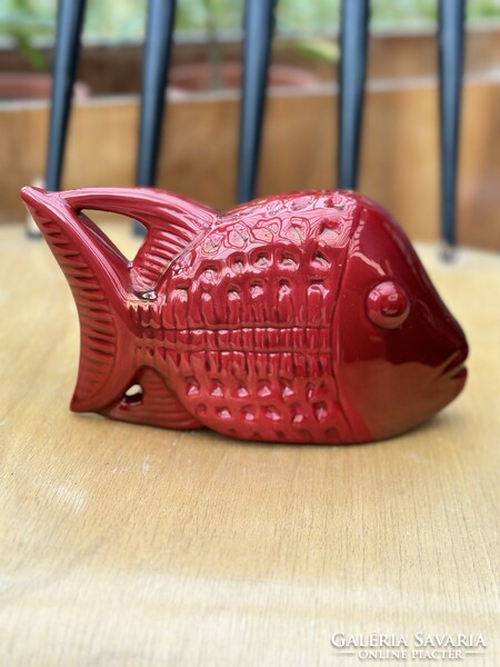 Zsolnay's oxblood-glazed fish with a curved tail, based on the designs of Palatine Judit. Very rare.