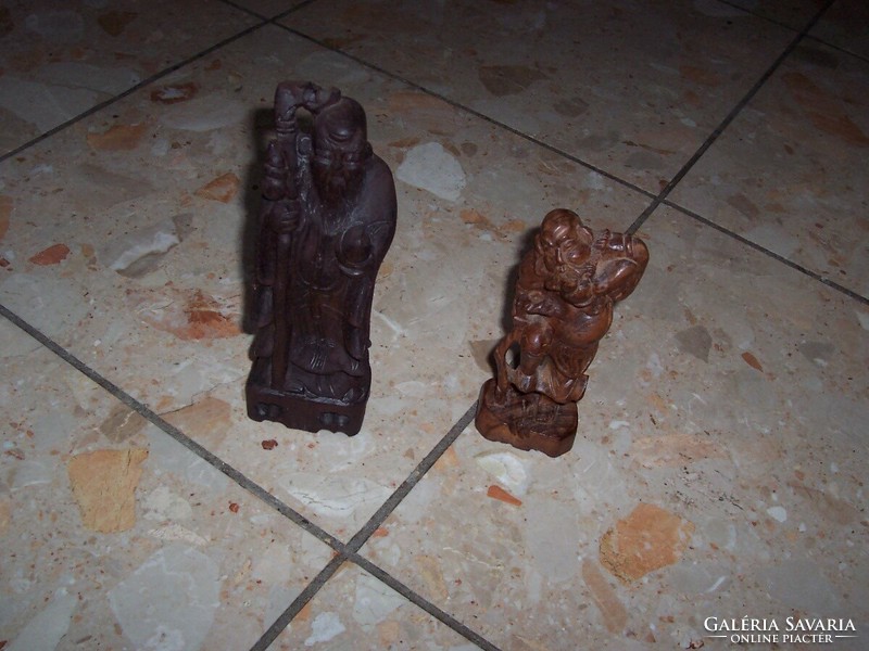 Wooden sculptures in pairs