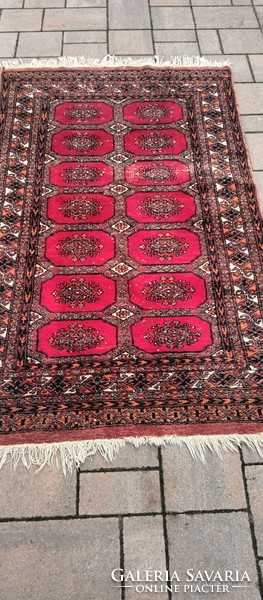 Hand-knotted Bokhara rug. Negotiable.