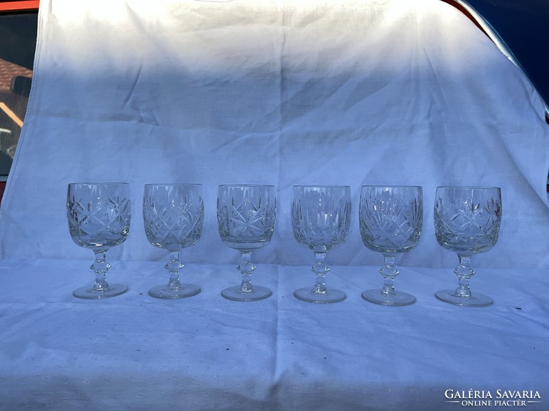 Crystal glasses, vases, table decorations are sold together