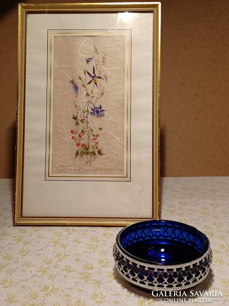 Royal blue glass offering in a silver-plated holder