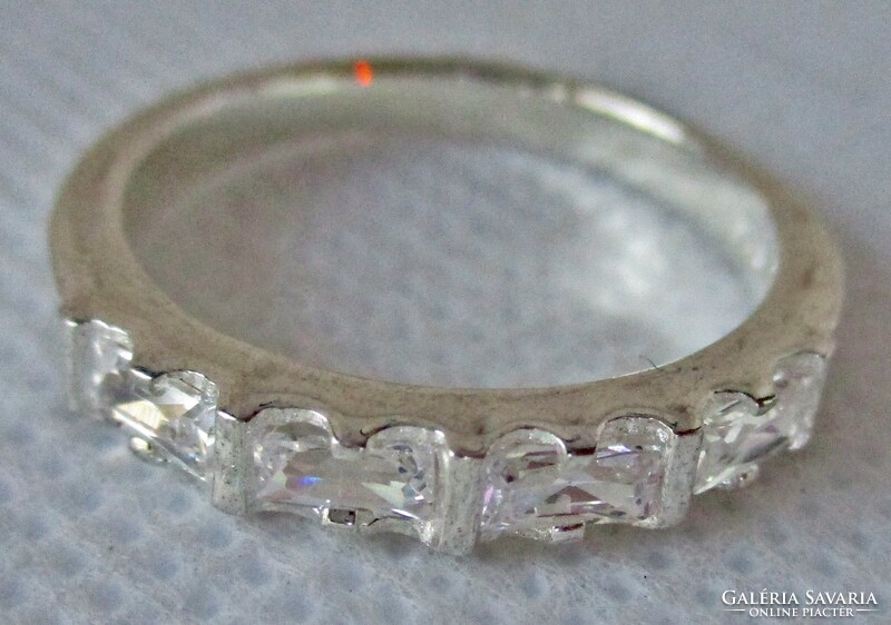 Beautiful silver wedding ring with special white zirconia stones