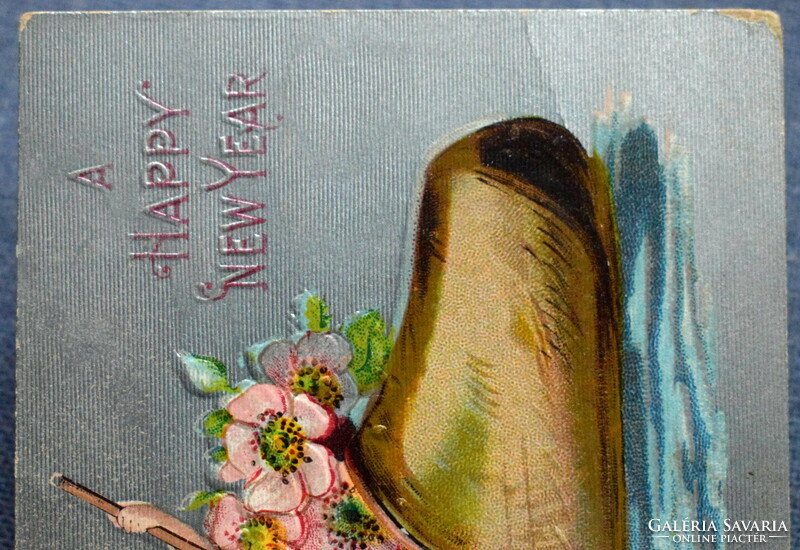 Antique silver background embossed New Year litho postcard - angel shoe boat flower