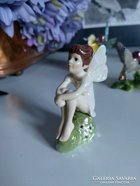Sweet forest fairy, angel, pixie, sitting in nature and watching, detailed rare figure