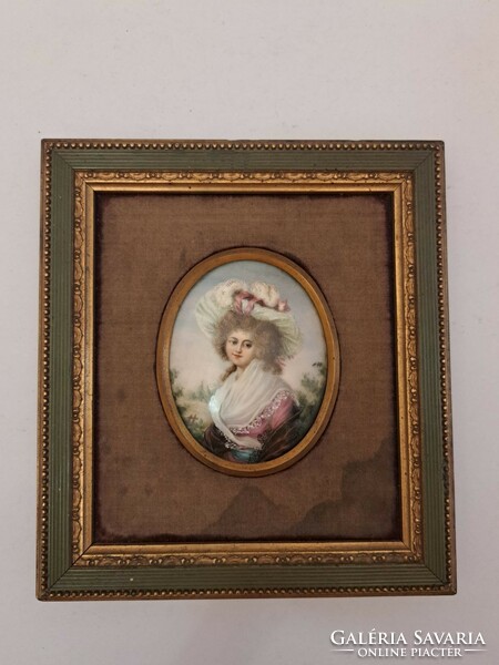 Hand-painted porcelain miniature female portrait painting in a frame