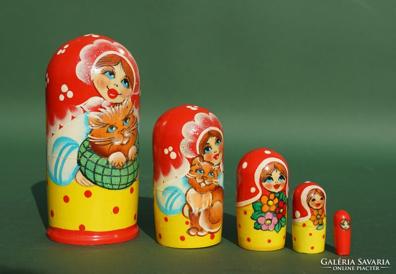 Old rare painted 5-piece Russian matryoshka doll girl with a cat