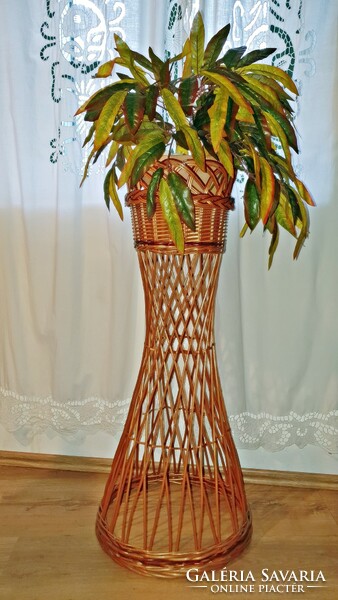 Rattan, cane flower stand 90 cm. High.