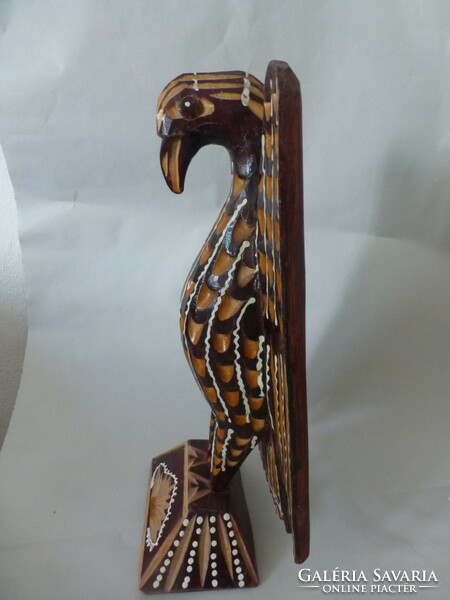 Carved wooden turul bird statue