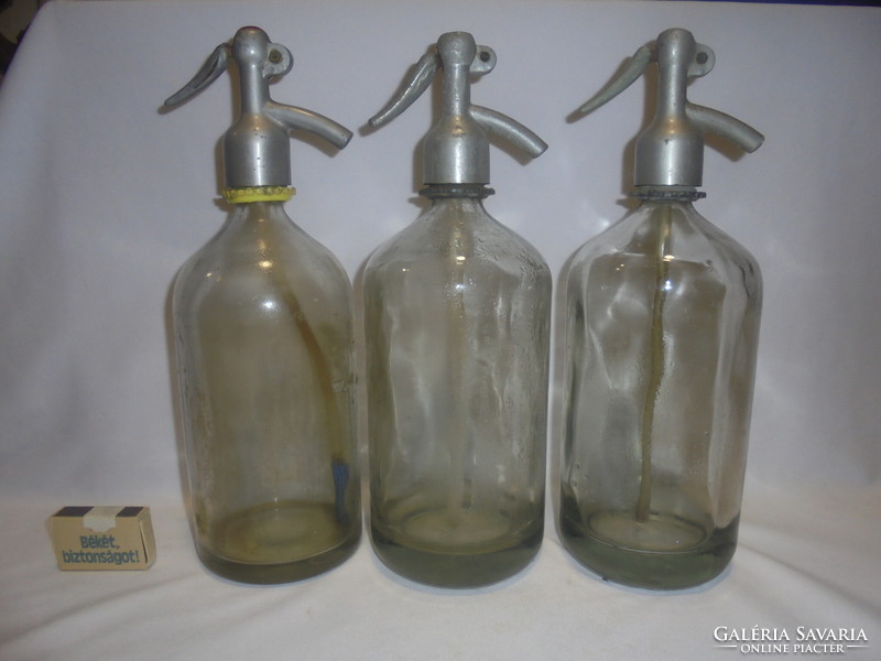Old aluminum soda bottle - three pieces together