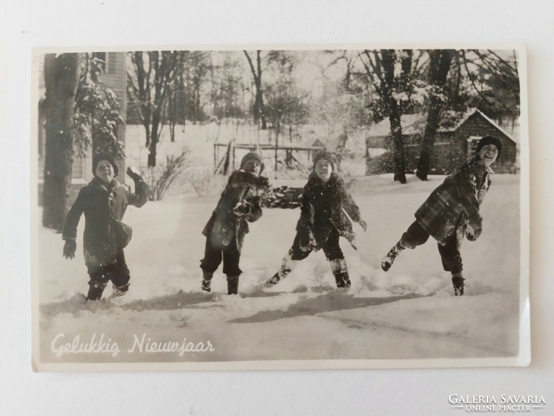 Old postcard photo postcard children making snowballs