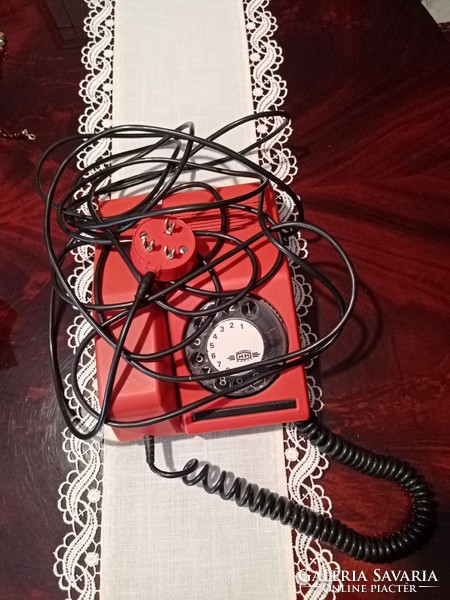 Retro red vinyl telephone device with original long cord