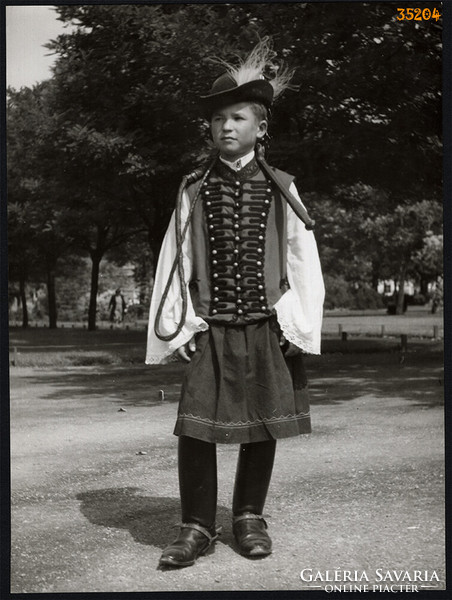 Larger size, photo art work by István Szendrő. Boy in gypsy folk costume.