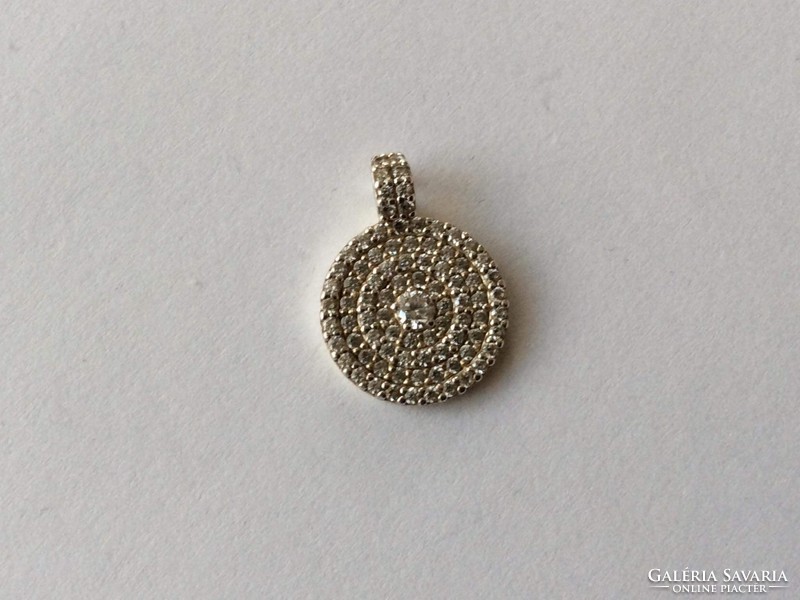 Silver pendant with small zircons
