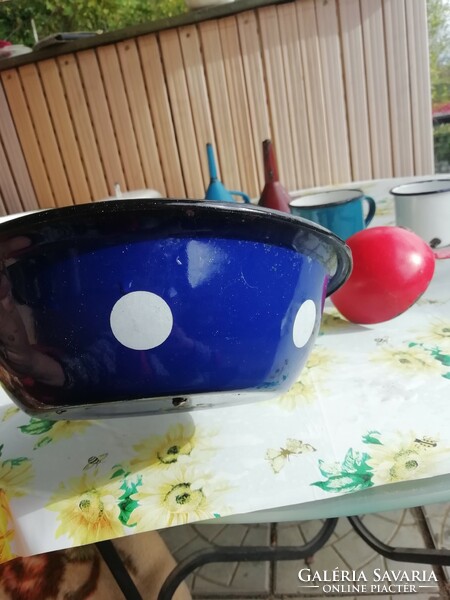 Old enamel kitchen utensils in the condition shown in the pictures