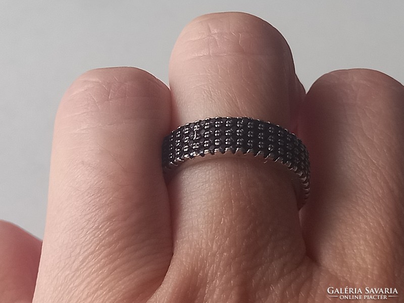 New women's silver ring with stones in a black circle