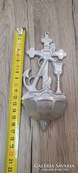 Aluminum holy water container.
