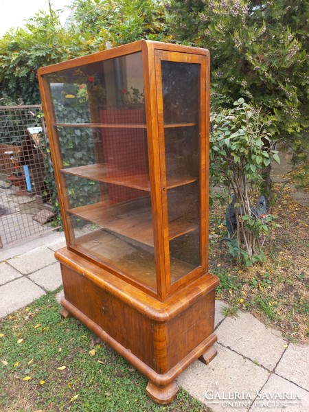 Art deco display case can be opened on two sides with a glass part.