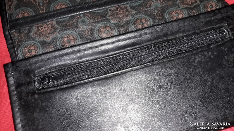 Old black leather waiter's wallet 