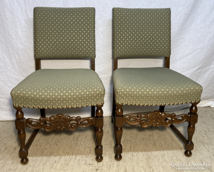 2 carved upholstered chairs