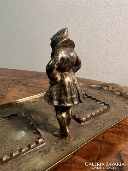 Brass clown girl on tray with glass containers
