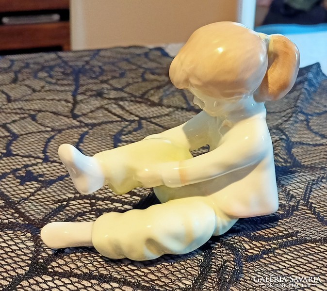 Aquincum porcelain figurine - little girl dressing up
