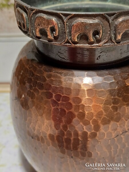 Industrial red copper vase with an elephant pattern