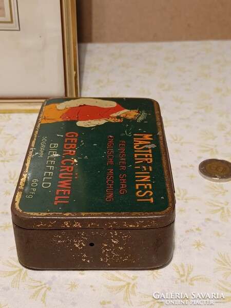 Old English metal box with pipe tobacco