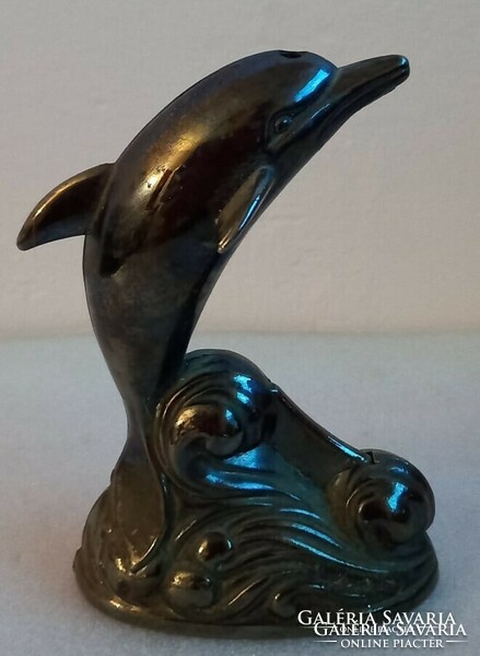Old dolphin shaped lighter.