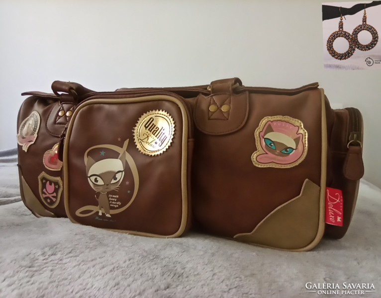 Original pussy deluxe handbag, plus handmade earrings as a gift