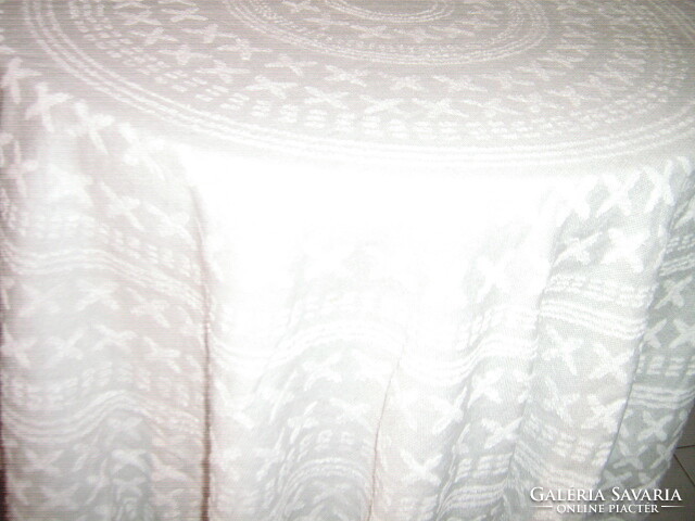 Beautiful gray white fringed tablecloth with fringed edges