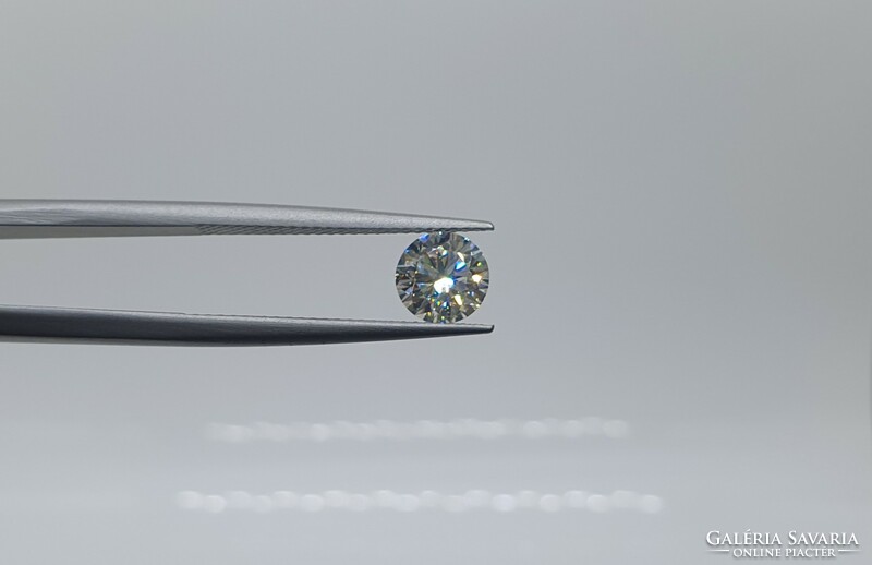 Extra 0.90 Carat brilliant cut moissanite. With certification.