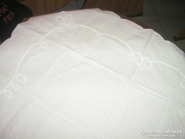 Beautiful sewn embroidered white tablecloth
