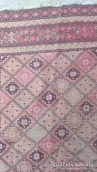 Hand-knotted antique Kazakh carpet is negotiable