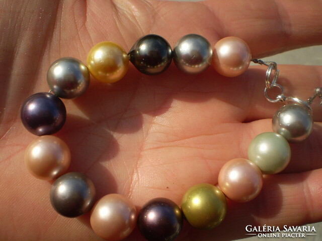 Price reduced. Unique 12 mm shell-pearl bracelet