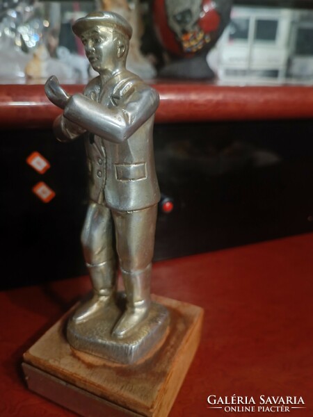 Metal worker guard statue