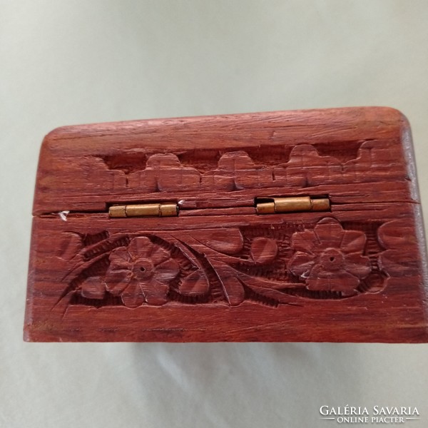 Carved wooden box with shell inlay