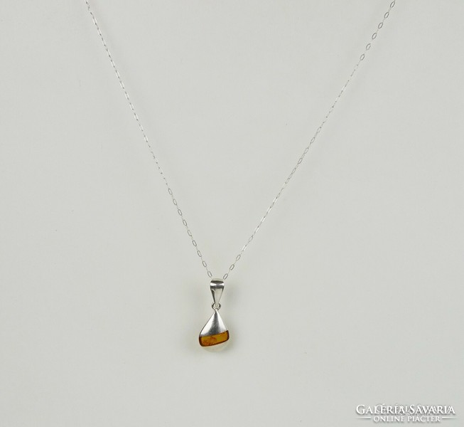 Silver necklaces with amber inlay