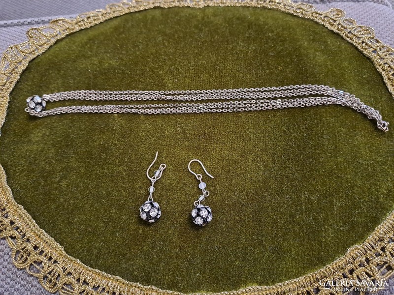 Necklace and earrings.