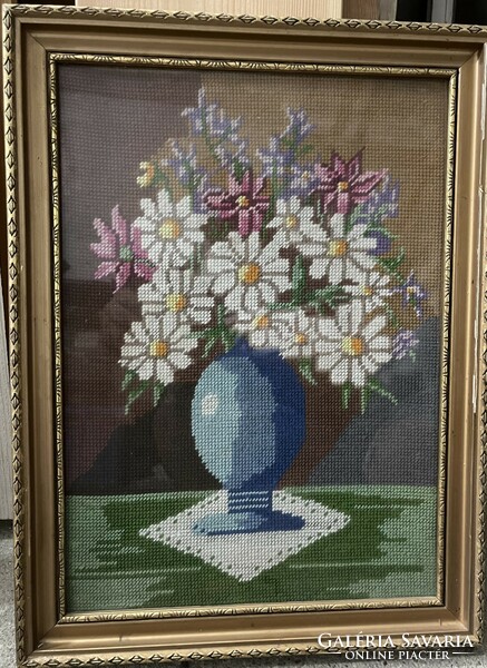 Gobelin is a vase of spring flowers