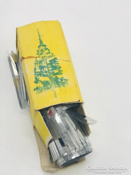 Old retfo Christmas tree decoration in foil garland box