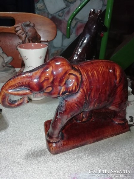 Ceramic elephant in the condition shown in the pictures