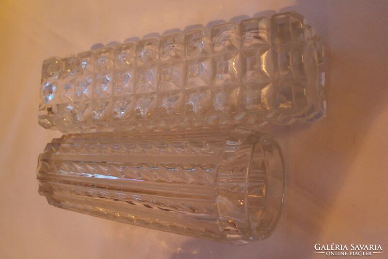 Two retro, rickety-walled, oblong-shaped, thick glass vases... Together.